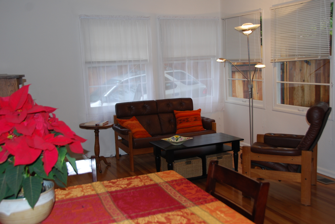 1064 Cheltenham Road Santa Barbara, CA 93105 - Photo 8 of 15 a living room with furniture a rug and a potted plant
