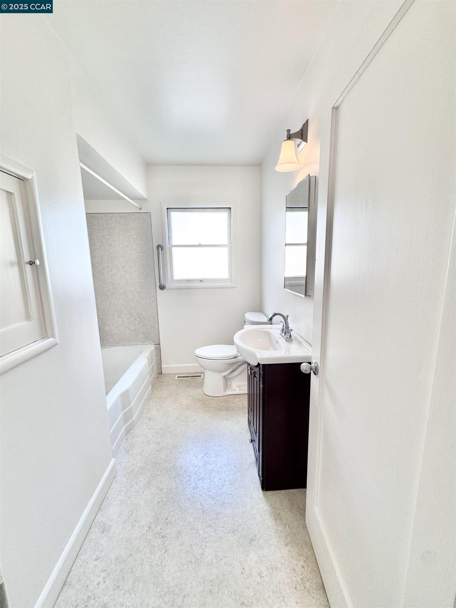 1834 Venice Drive Concord, CA 94519 - Photo 16 of 25 a bathroom with a bathtub and a sink
