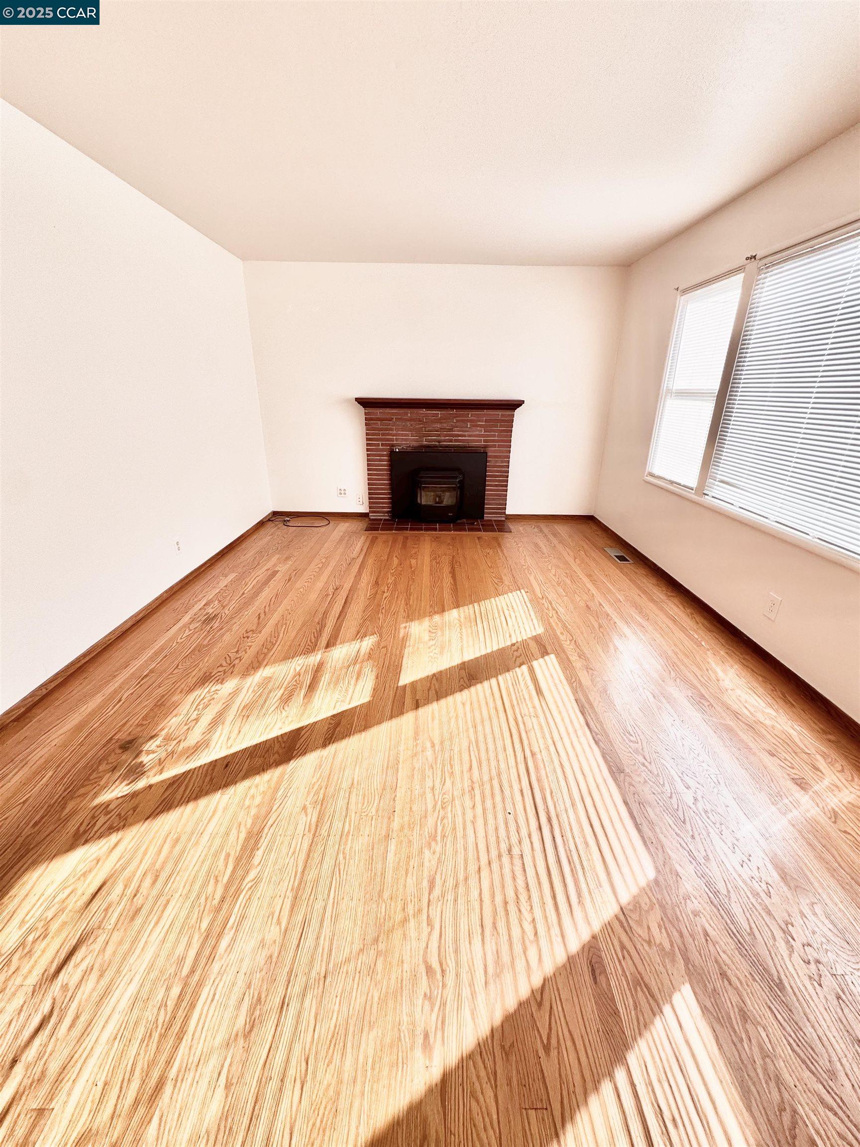 1834 Venice Drive Concord, CA 94519 - Photo 6 of 25 a view of a room with wooden floor and furniture