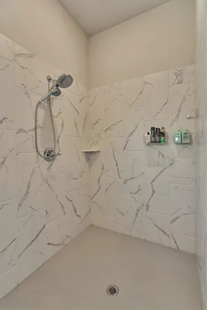 a bathroom with a sink and mirror