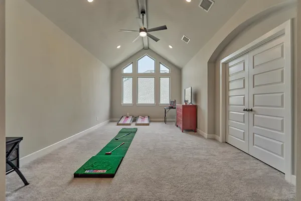 a view of a hallway with a chandelier
