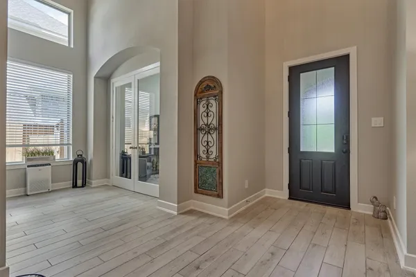 wooden floor in kitchen with a living room