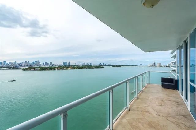 a view of a lake from a balcony