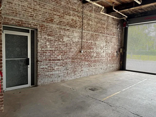 a view of empty room with windows