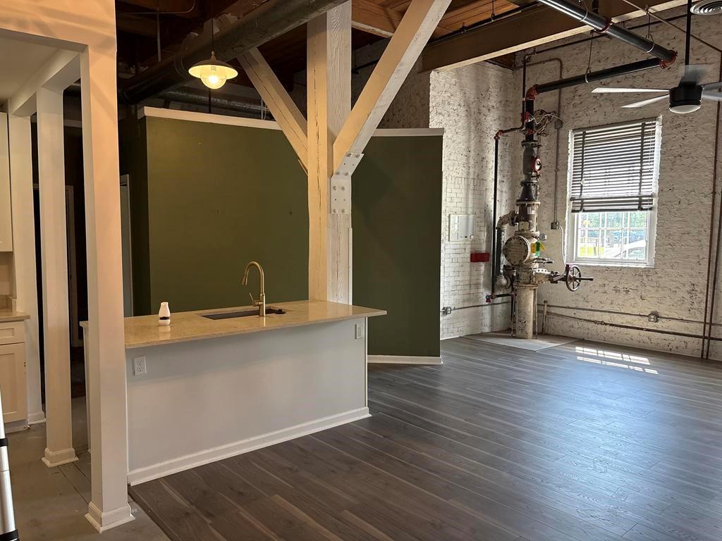 320 Martin Luther King Junior Drive Southeast, Unit 18A Atlanta, GA 30312 - Photo 4 of 15 an entryway with wooden floor and door