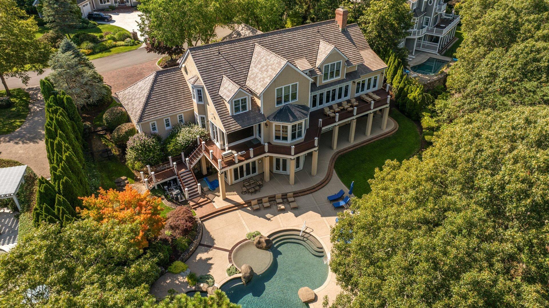 a aerial view of a house with a yard