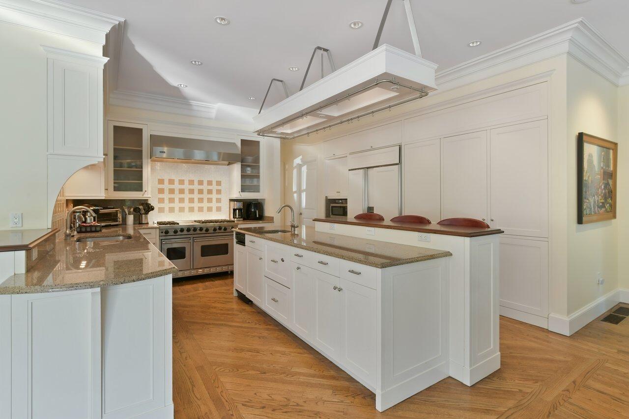 37 Shoestring Bay Road Mashpee, MA 02649 - Photo 17 of 42 a kitchen with stainless steel appliances granite countertop a sink and a stove