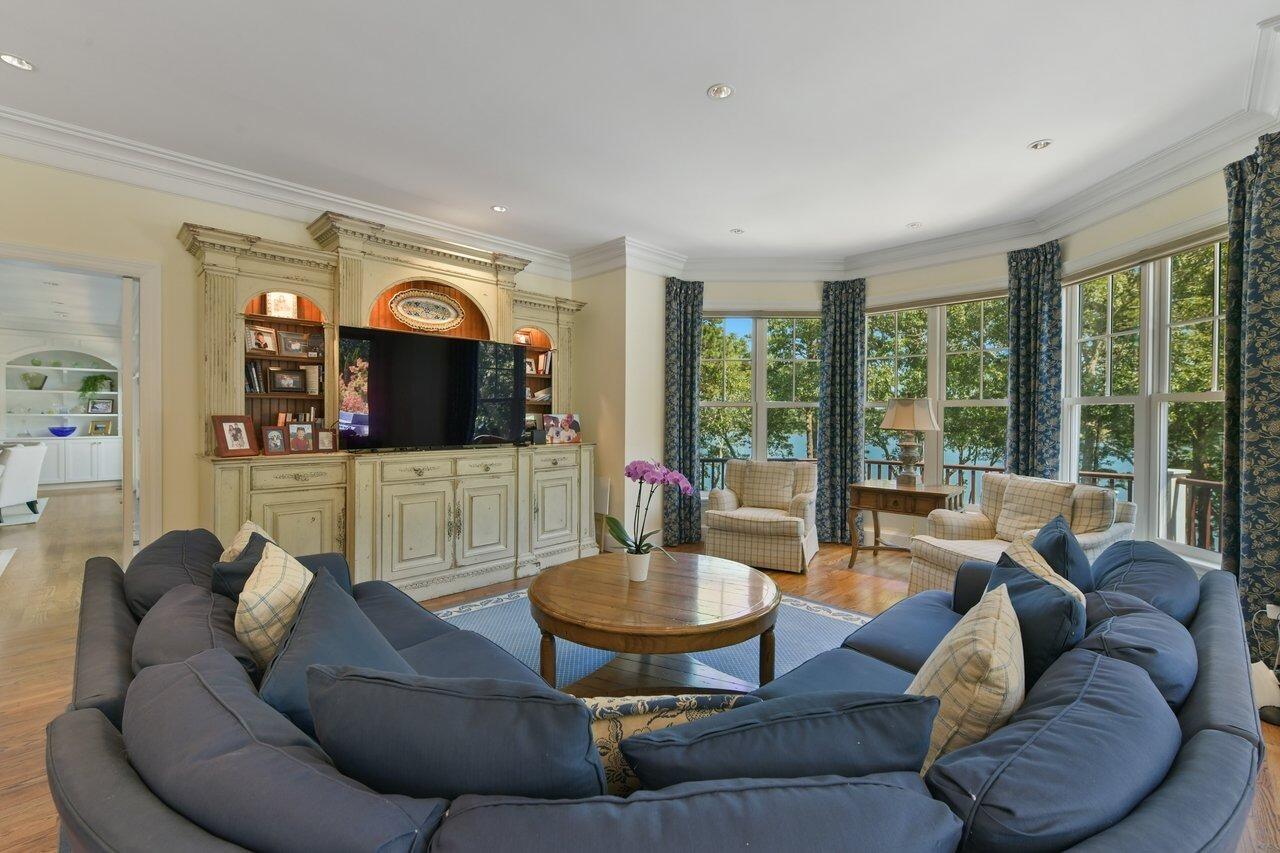 37 Shoestring Bay Road Mashpee, MA 02649 - Photo 19 of 42 a living room with furniture and a large window