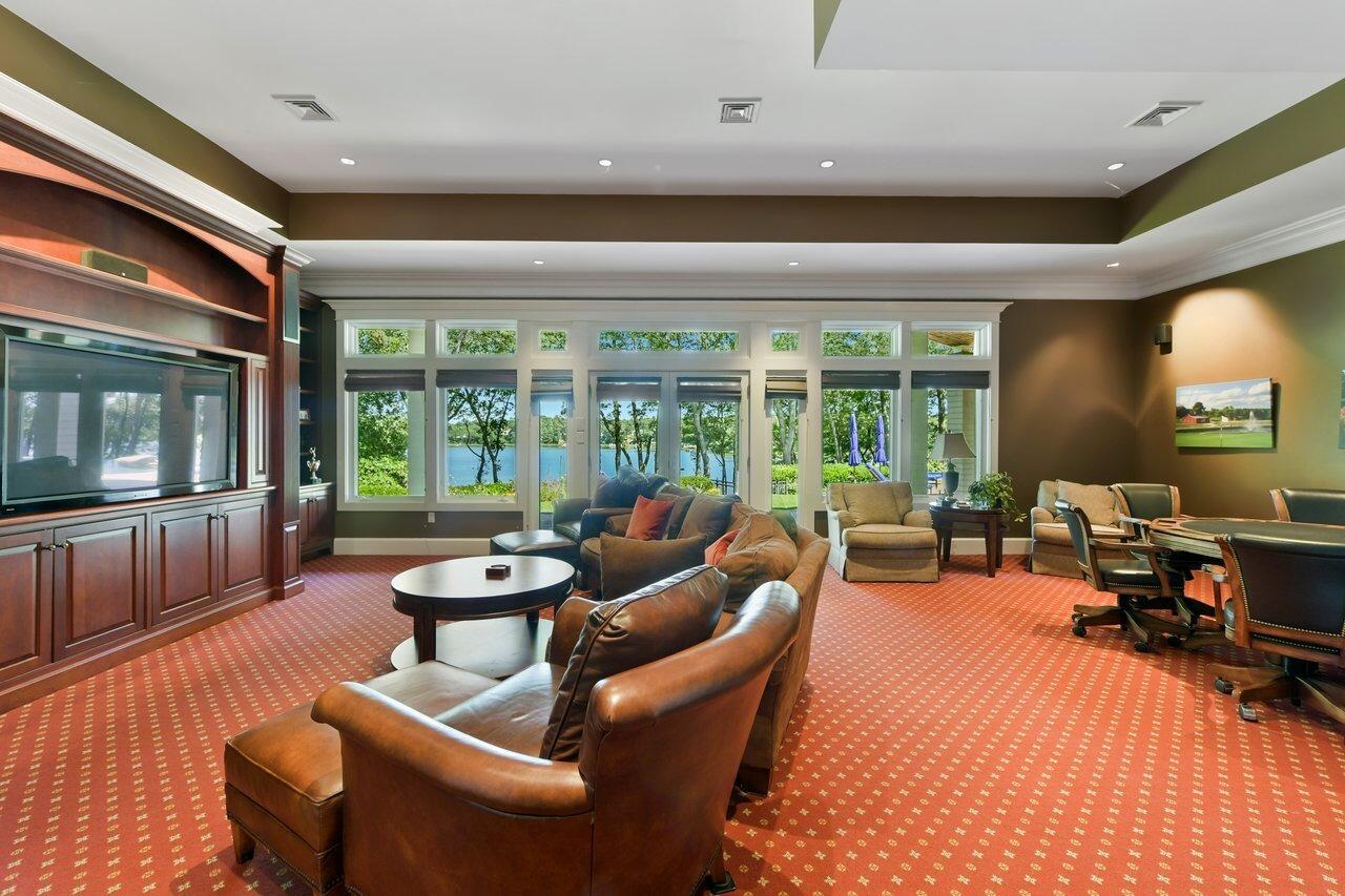 37 Shoestring Bay Road Mashpee, MA 02649 - Photo 30 of 42 a living room with furniture and a large window