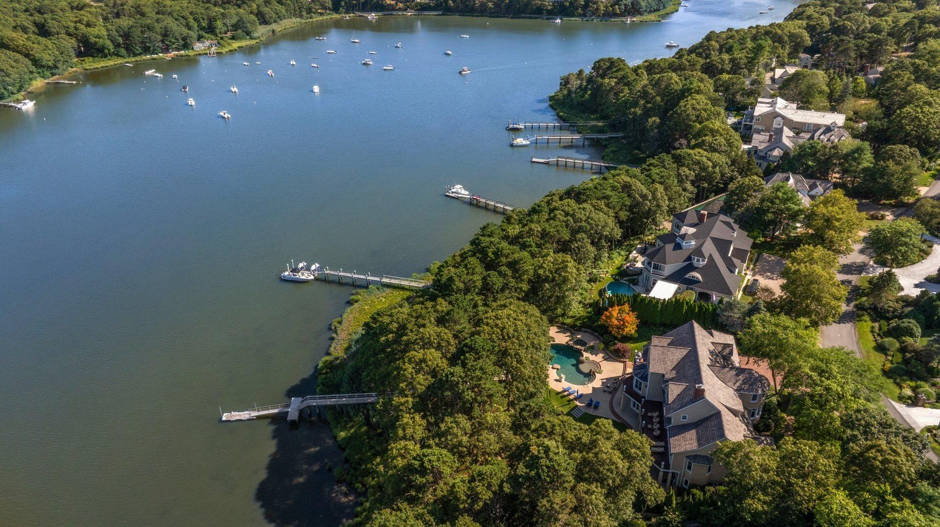 37 Shoestring Bay Road Mashpee, MA 02649 - Photo 3 of 42 an aerial view of residential house with outdoor space and trees all around