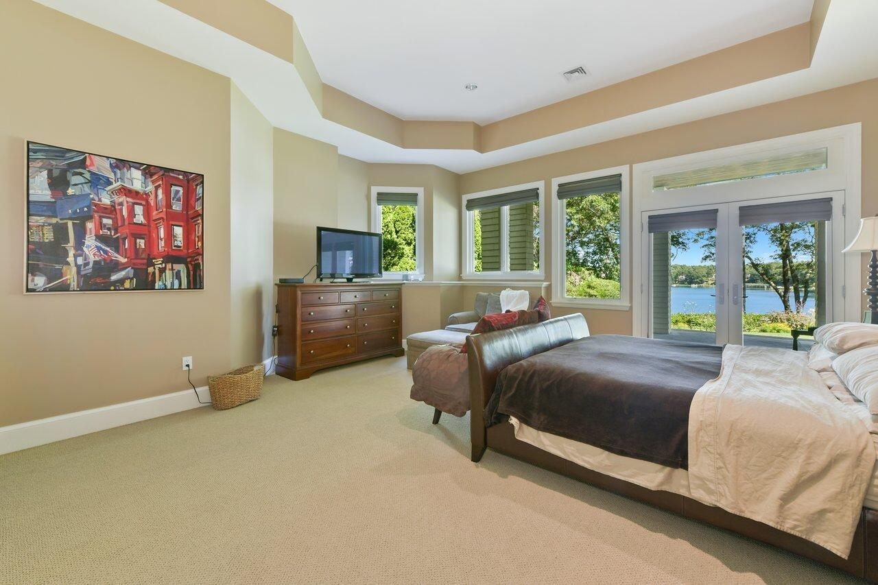 37 Shoestring Bay Road Mashpee, MA 02649 - Photo 31 of 42 a bedroom with a bed and a couch