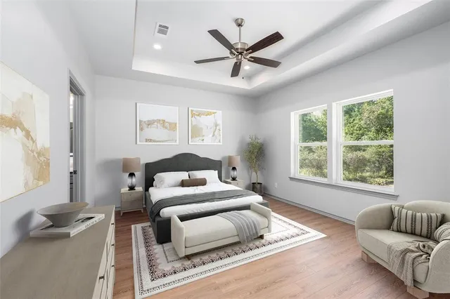 a bedroom with a bed furniture and a window