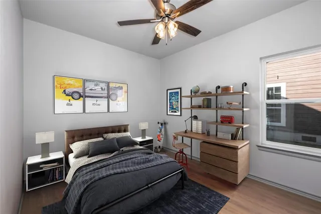 a bedroom with a bed furniture and a window