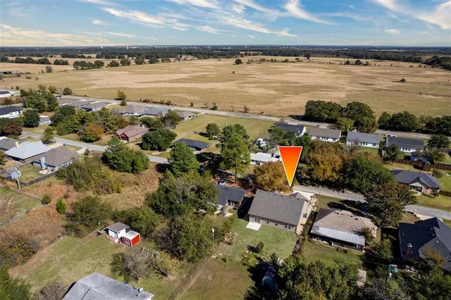 a balcony with chairs and ocean view
