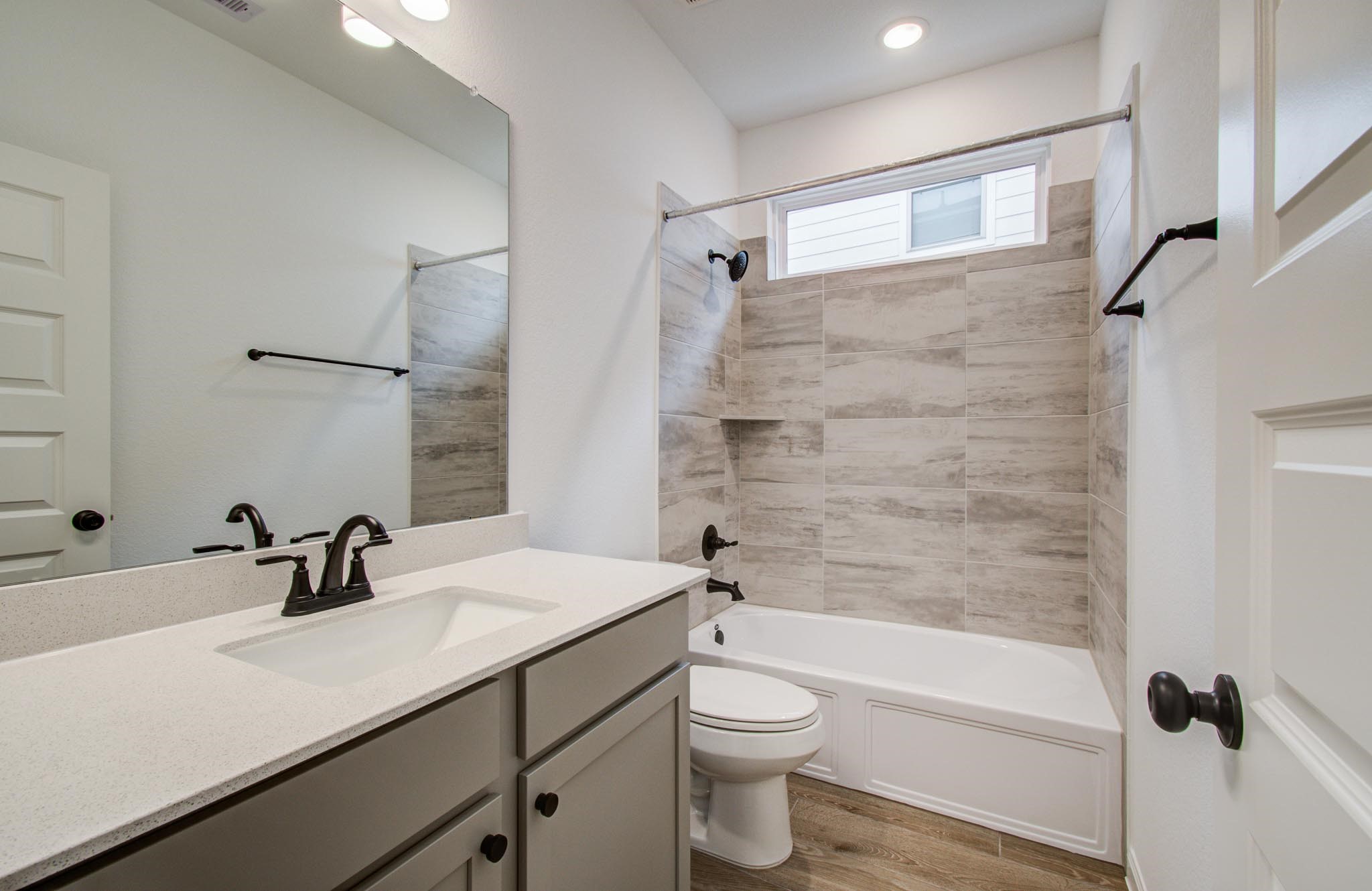7231 Yarrow Blossom Court Katy, TX 77493 - Photo 24 of 49 a bathroom with a sink a toilet and shower