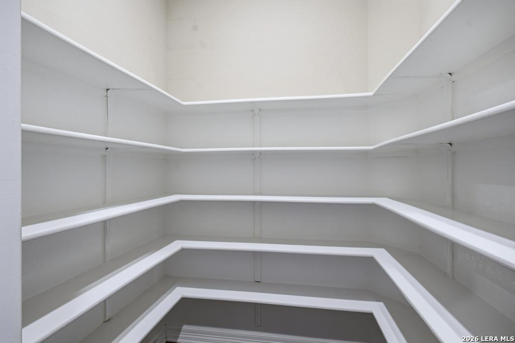 287 Cascade Trail Castroville, TX 78009 - Photo 15 of 46 a view of walk in closet with empty racks