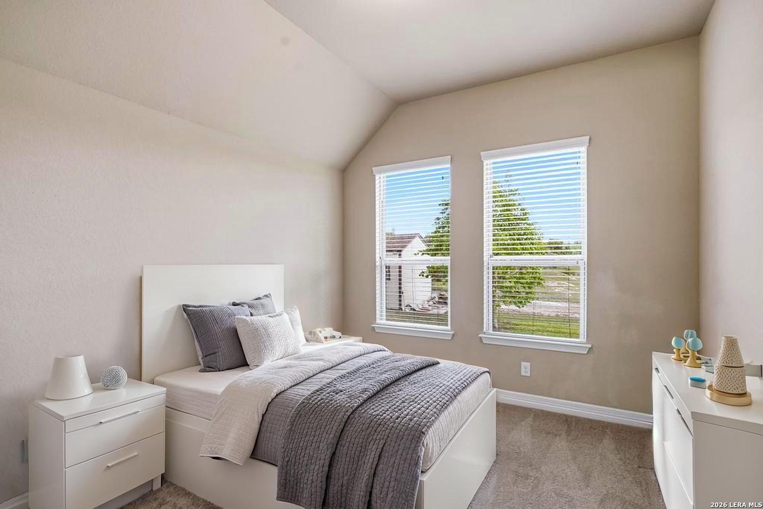 287 Cascade Trail Castroville, TX 78009 - Photo 25 of 46 a bedroom with a bed and a window