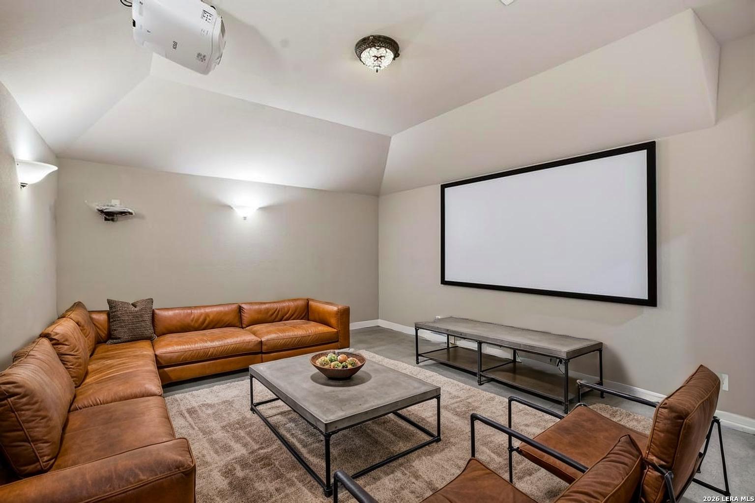 287 Cascade Trail Castroville, TX 78009 - Photo 31 of 46 a projector room with furniture
