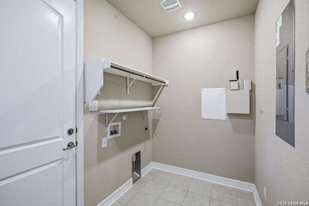 287 Cascade Trail Castroville, TX 78009 - Photo 33 of 46 a bathroom with a shower and mirror
