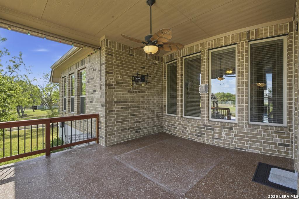 287 Cascade Trail Castroville, TX 78009 - Photo 35 of 46 a view of a house with a porch
