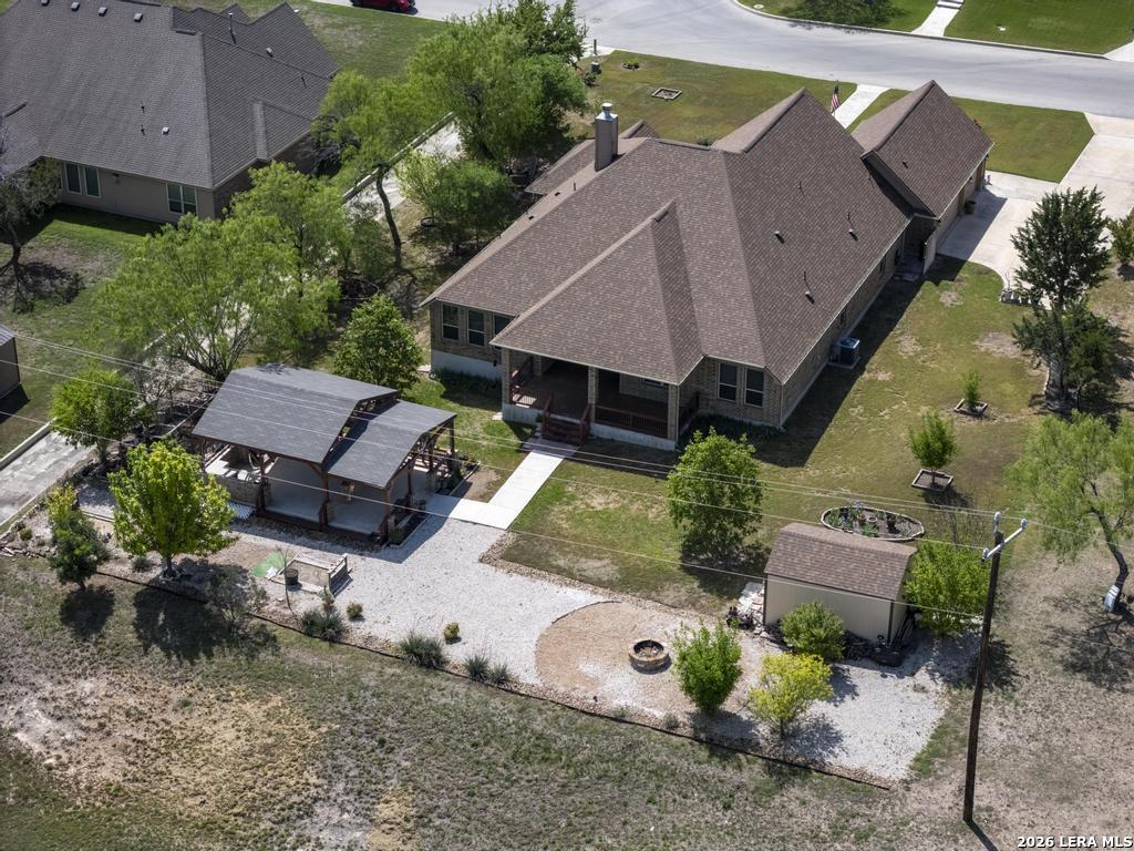 287 Cascade Trail Castroville, TX 78009 - Photo 46 of 46 an aerial view of a house with garden space and street view