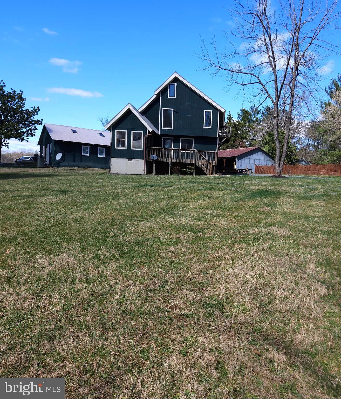 13256 Golden Drive Sumerduck, VA 22742 - Photo 2 of 27 a front view of a house with a yard