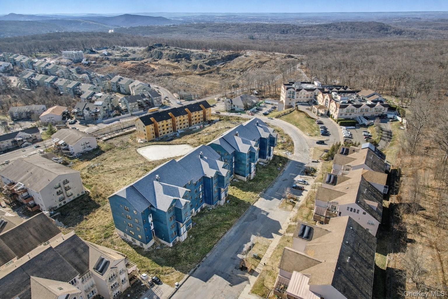 16 Chevron Road, Unit 302 Monroe, NY 10950 - Photo 5 of 11 Aerial view of property and surrounding area