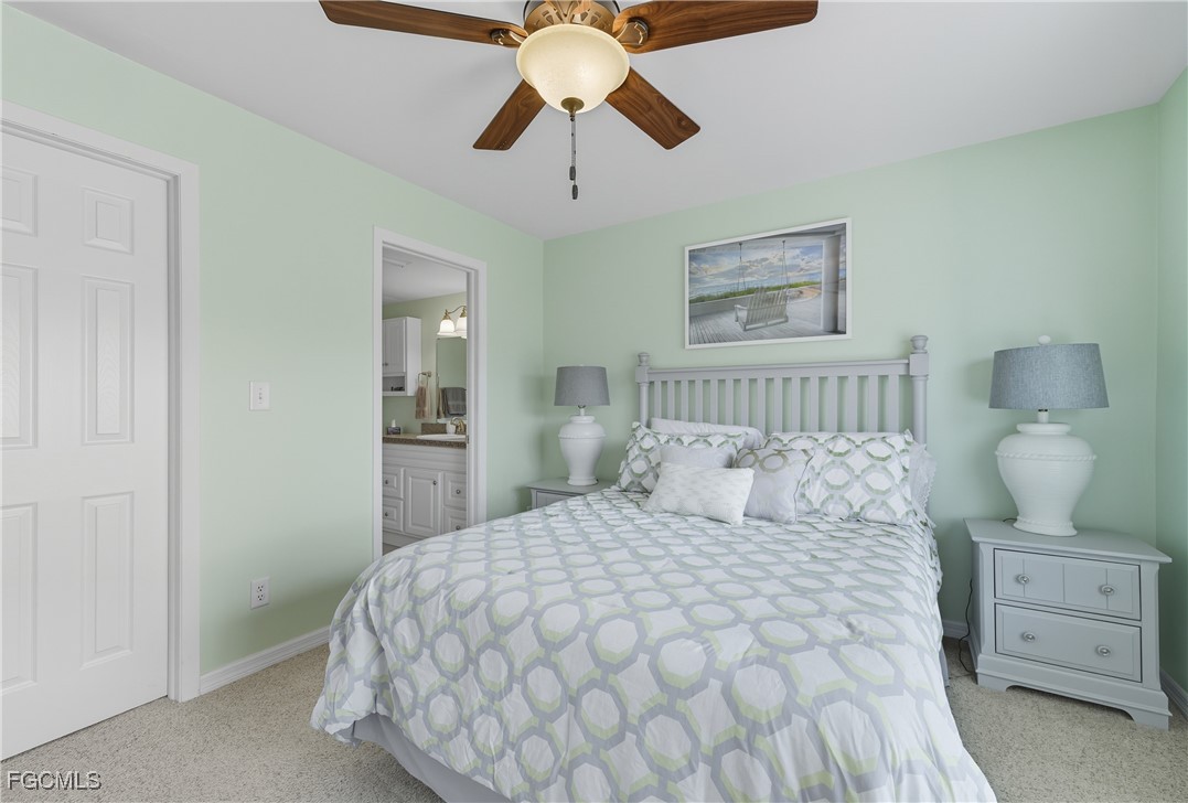 16881 Davis Road, Unit 126 Fort Myers, FL 33908 - Photo 16 of 27 a bedroom with a bed and window