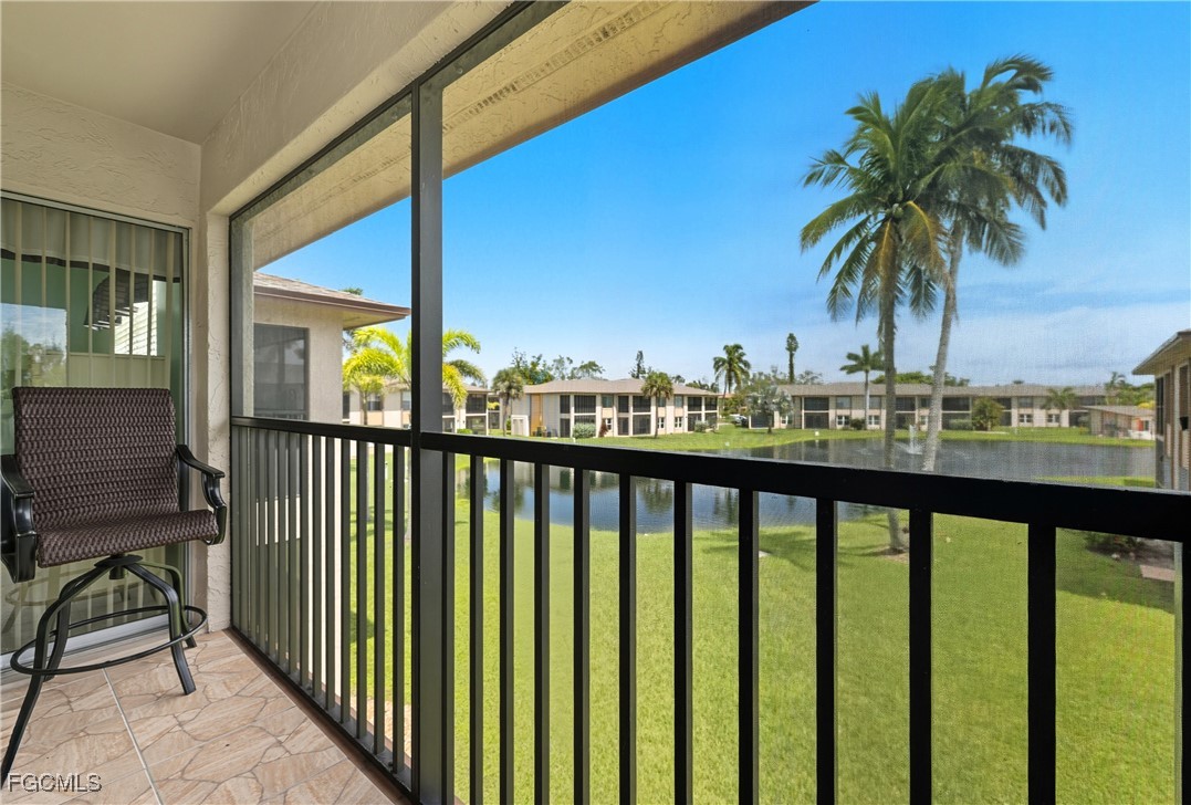 16881 Davis Road, Unit 126 Fort Myers, FL 33908 - Photo 21 of 27 a view of a balcony with potted plants