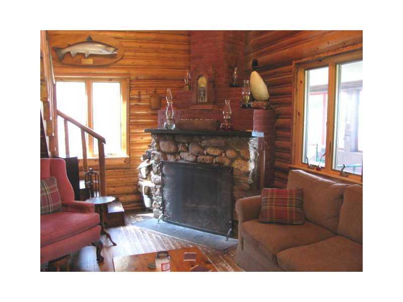 79 Bald Mountain Road Oquossoc, ME 04964 - Photo 6 of 15 Living Room.