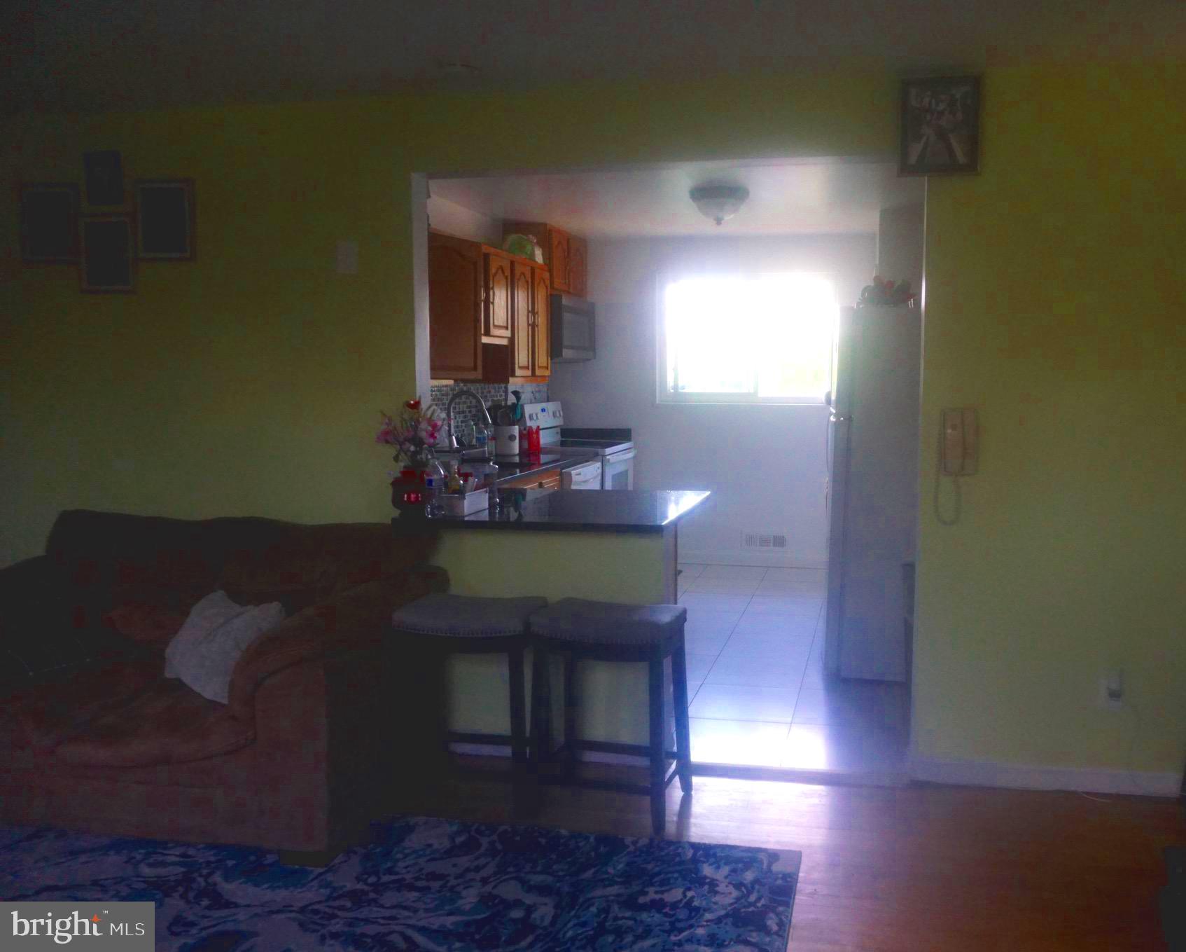 3521 Hargo Street Silver Spring, MD 20906 - Photo 5 of 6 Living room looking into the kitchen