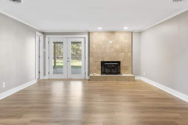 a kitchen with granite countertop a sink and a stove top oven