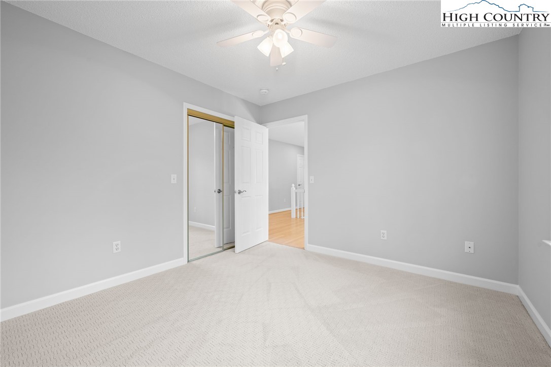 458 Jim Caudill Road Wilkesboro, NC 28697 - Photo 25 of 50 a view of an empty room with a window