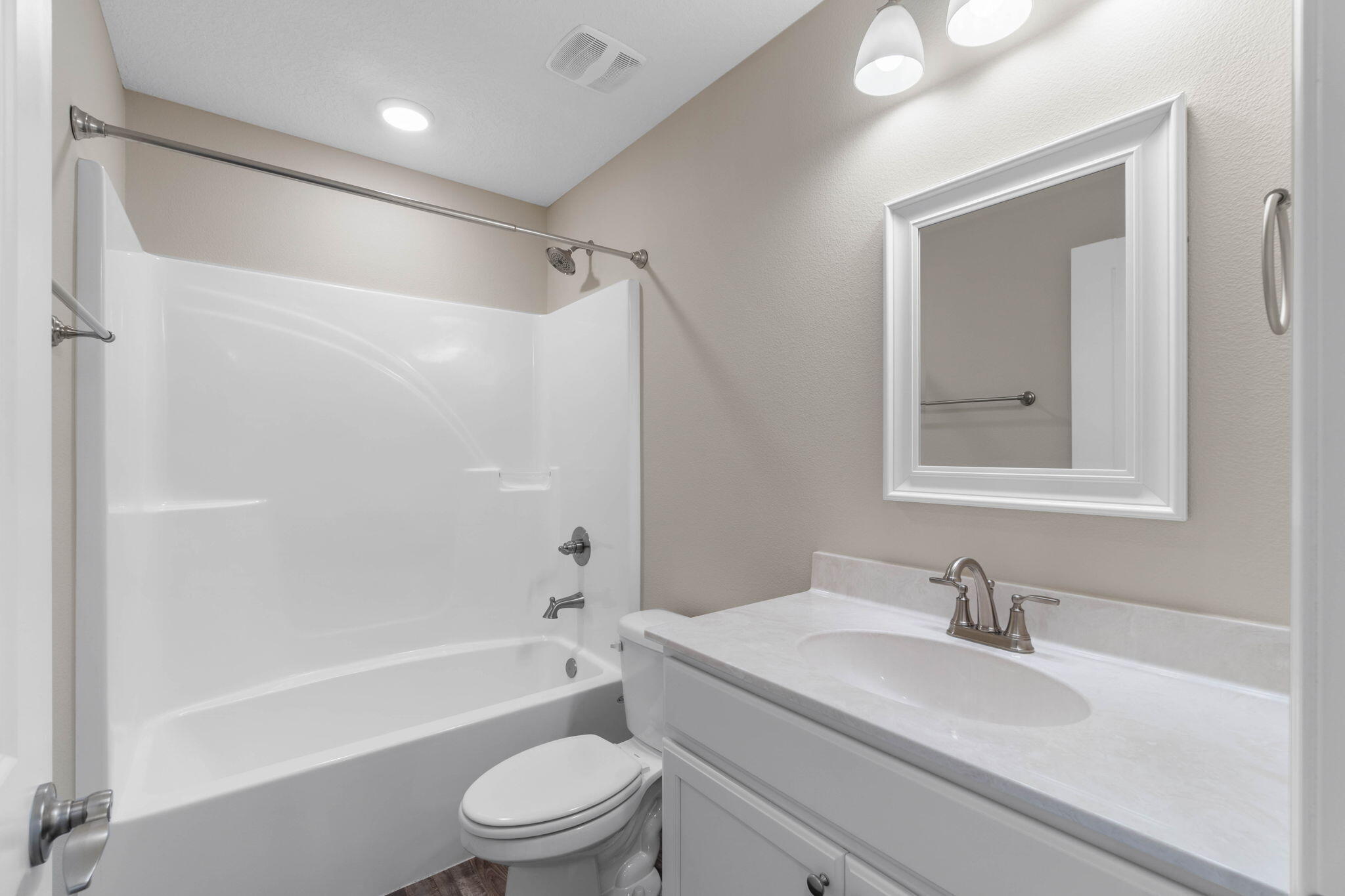 145 4th Avenue Crestview, FL 32539 - Photo 17 of 31 a bathroom with a granite countertop sink toilet and shower