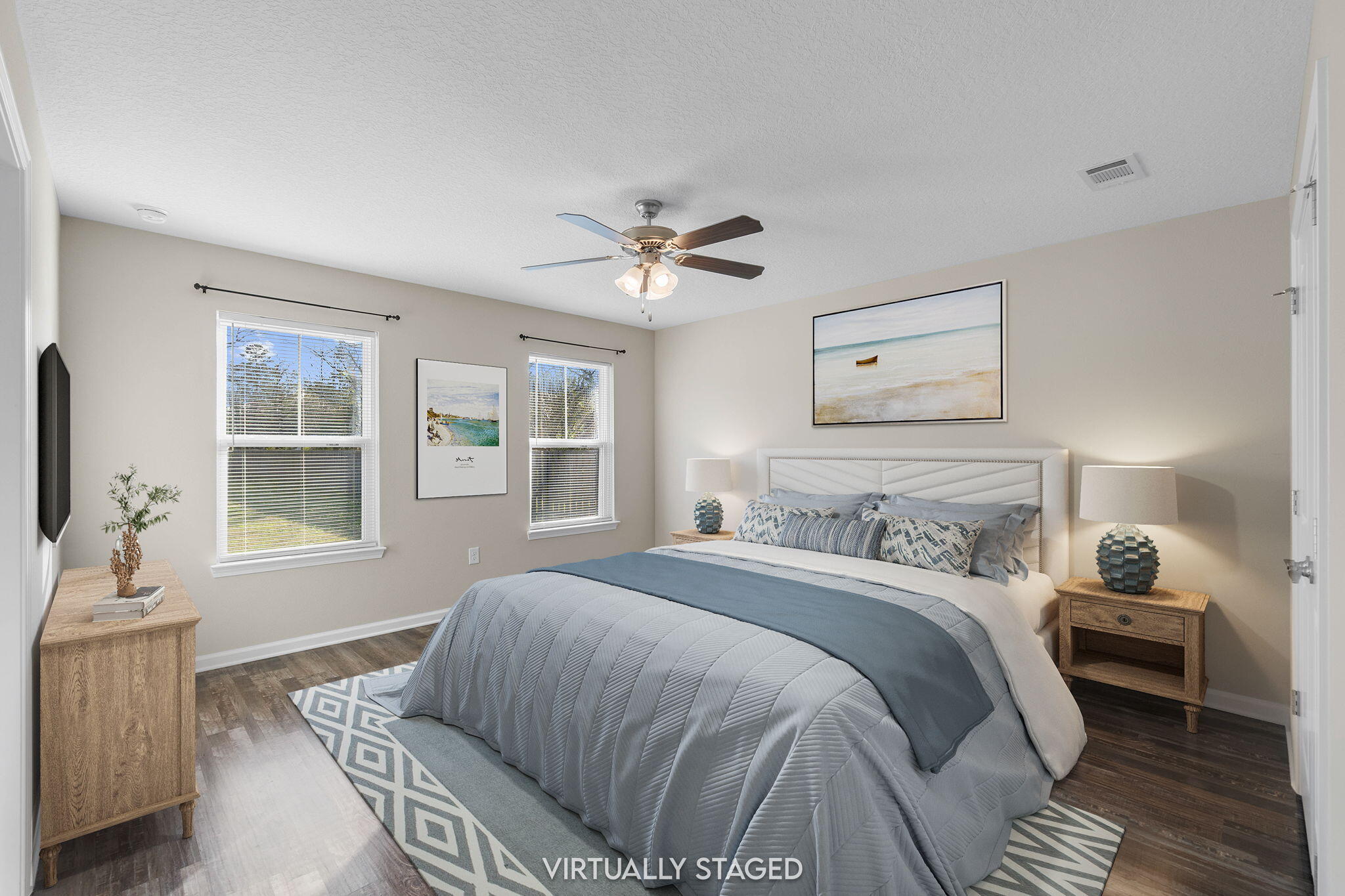145 4th Avenue Crestview, FL 32539 - Photo 21 of 31 a bedroom with a large bed couch and a window