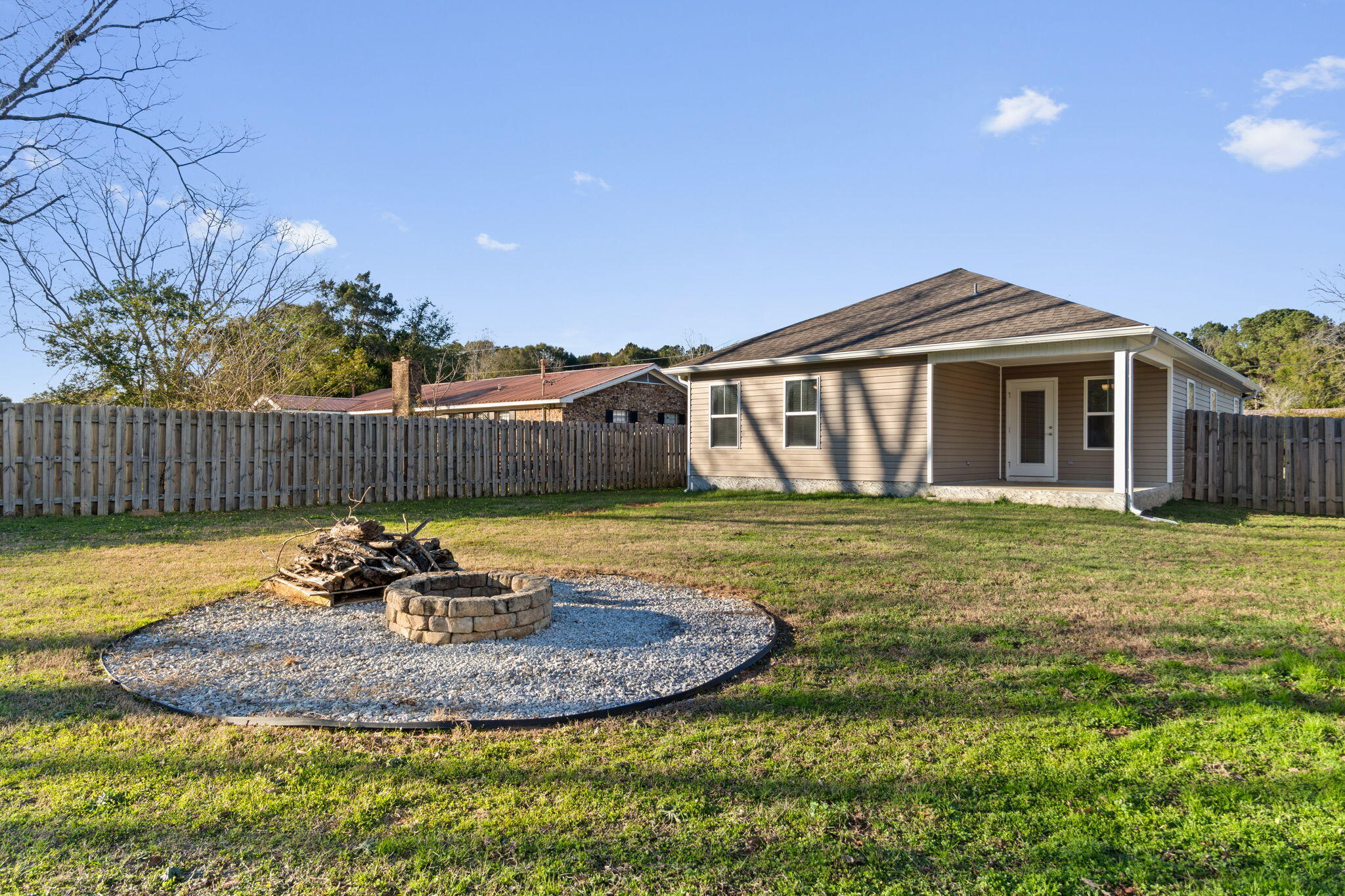 145 4th Avenue Crestview, FL 32539 - Photo 30 of 31 a view of a house with backyard and sitting area
