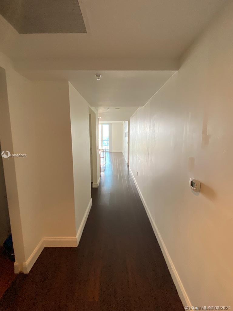 185 Southwest 7th Street, Unit 3403 Miami, FL 33130 - Photo 11 of 34 a view of hallway with stairs