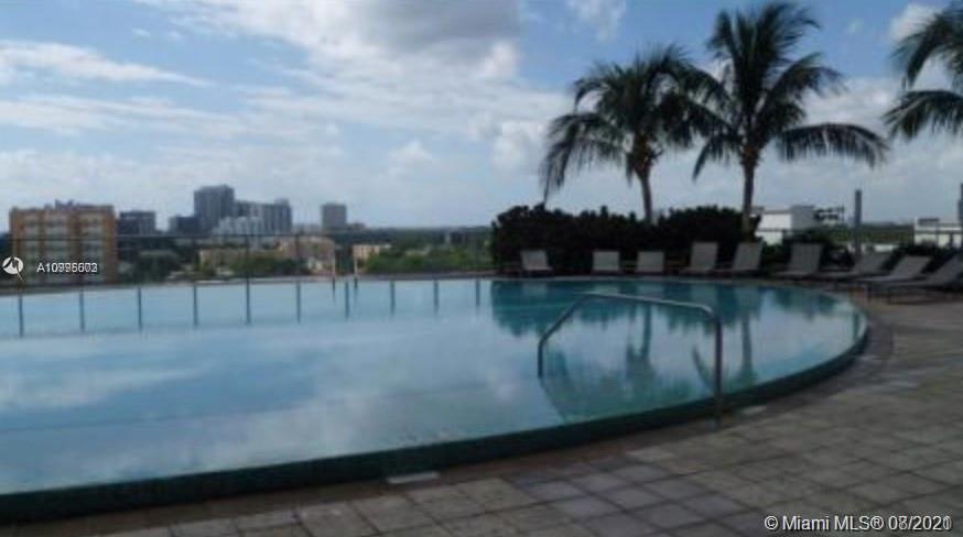 185 Southwest 7th Street, Unit 3403 Miami, FL 33130 - Photo 34 of 34 a view of a swimming pool with a lake