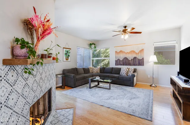 a living room with furniture and a flat screen tv