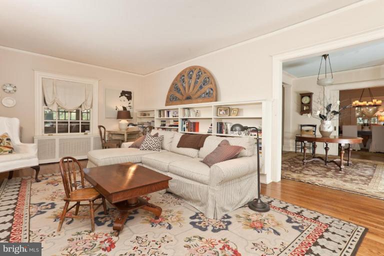 108 Longwood Road Baltimore, MD 21210 - Photo 14 of 28 a living room with furniture a rug and a table