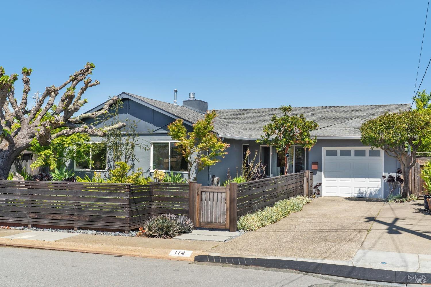 114 Hawthorne Way San Rafael, CA 94903 - Photo 1 of 1 a front view of a house with a yard
