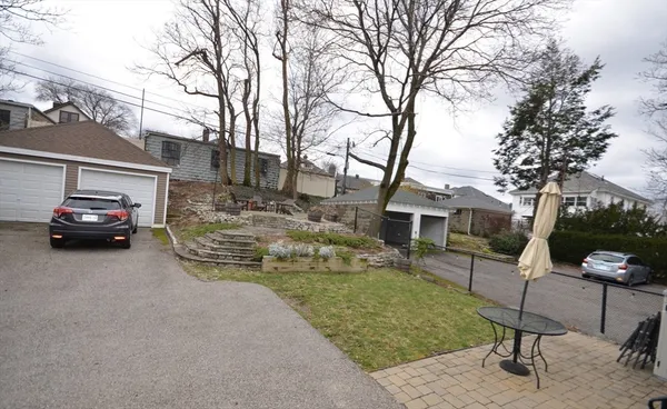 a view of a house with a back yard