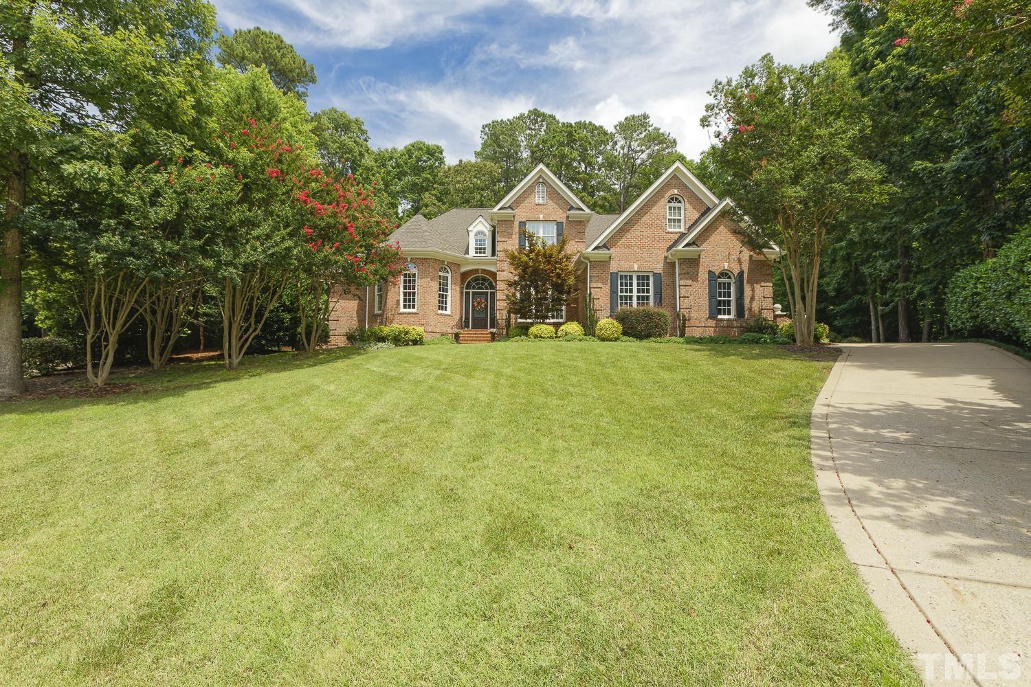 5201 Rathkeale Court Holly Springs, NC 27540 - Photo 1 of 46 a front view of a house with yard
