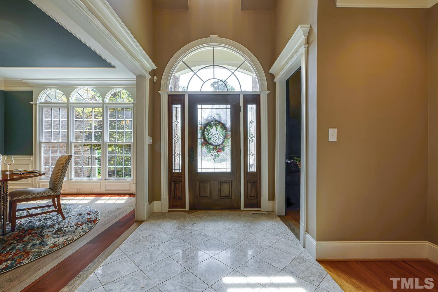 5201 Rathkeale Court Holly Springs, NC 27540 - Photo 3 of 46 a view of a livingroom with furniture and staircase