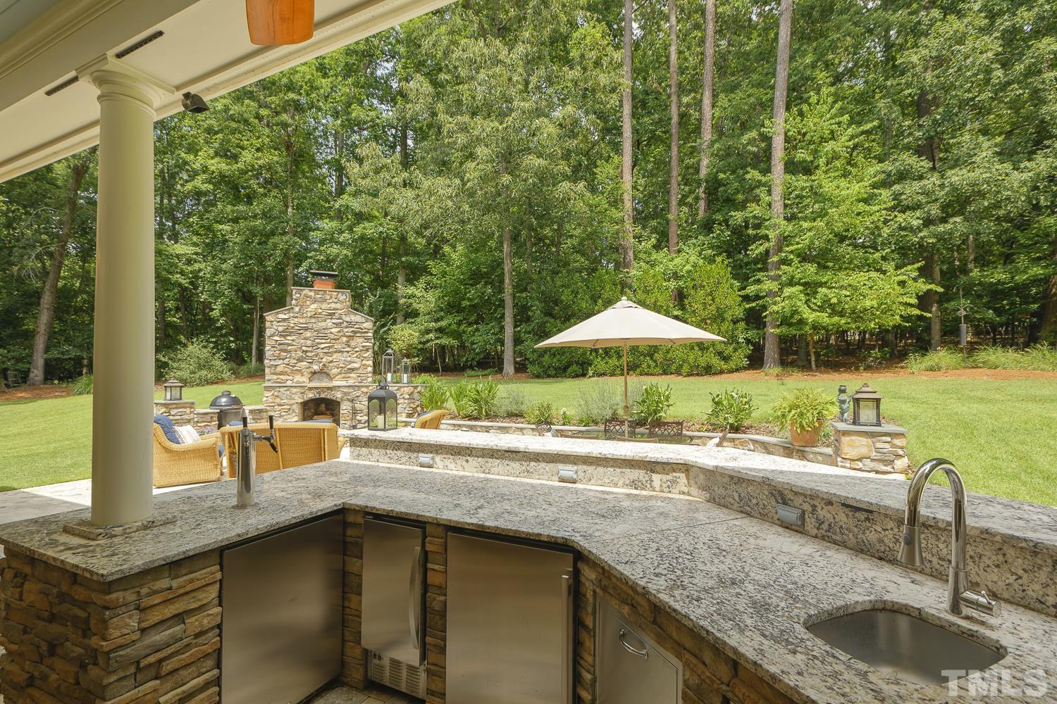 5201 Rathkeale Court Holly Springs, NC 27540 - Photo 35 of 46 a kitchen with a sink and a large window