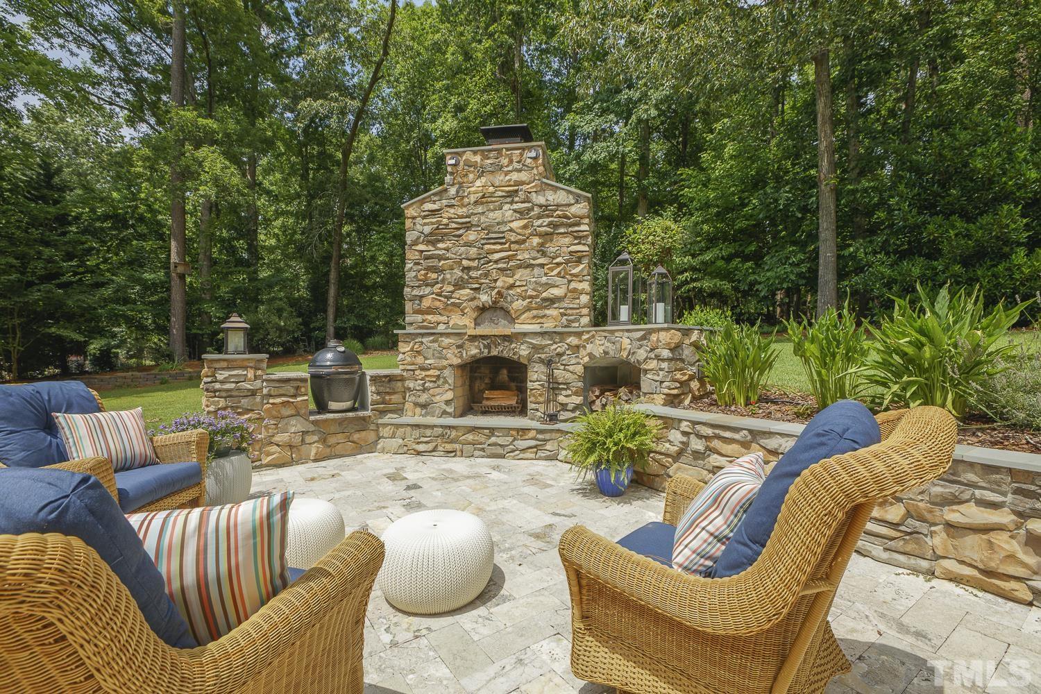 5201 Rathkeale Court Holly Springs, NC 27540 - Photo 38 of 46 a view of an outdoor sitting area with furniture and sitting area