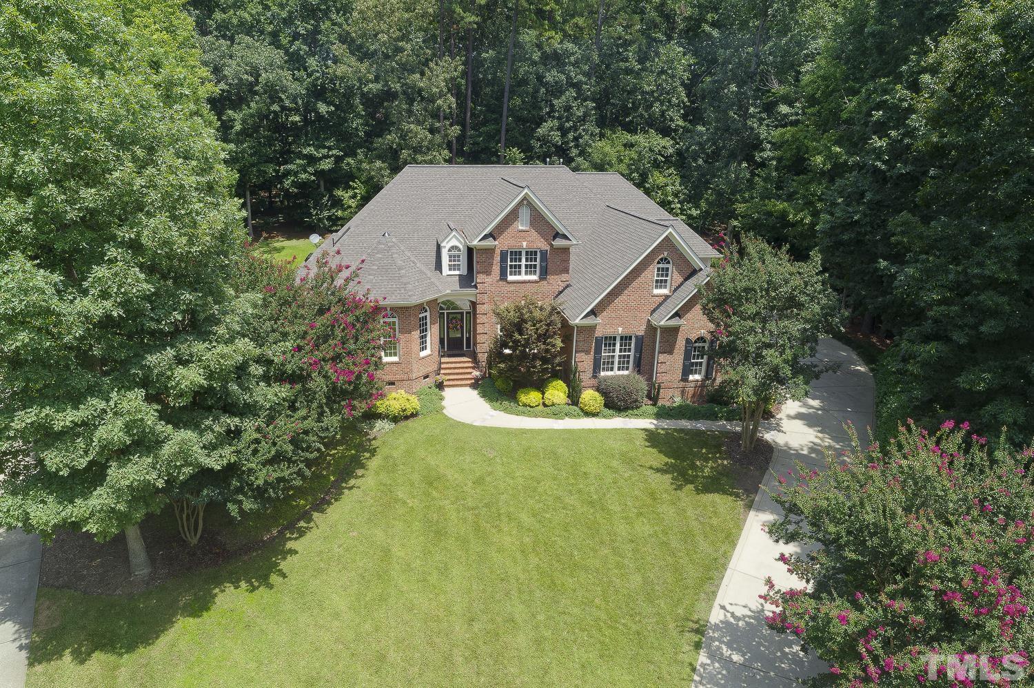 5201 Rathkeale Court Holly Springs, NC 27540 - Photo 43 of 46 a view of a house with a yard