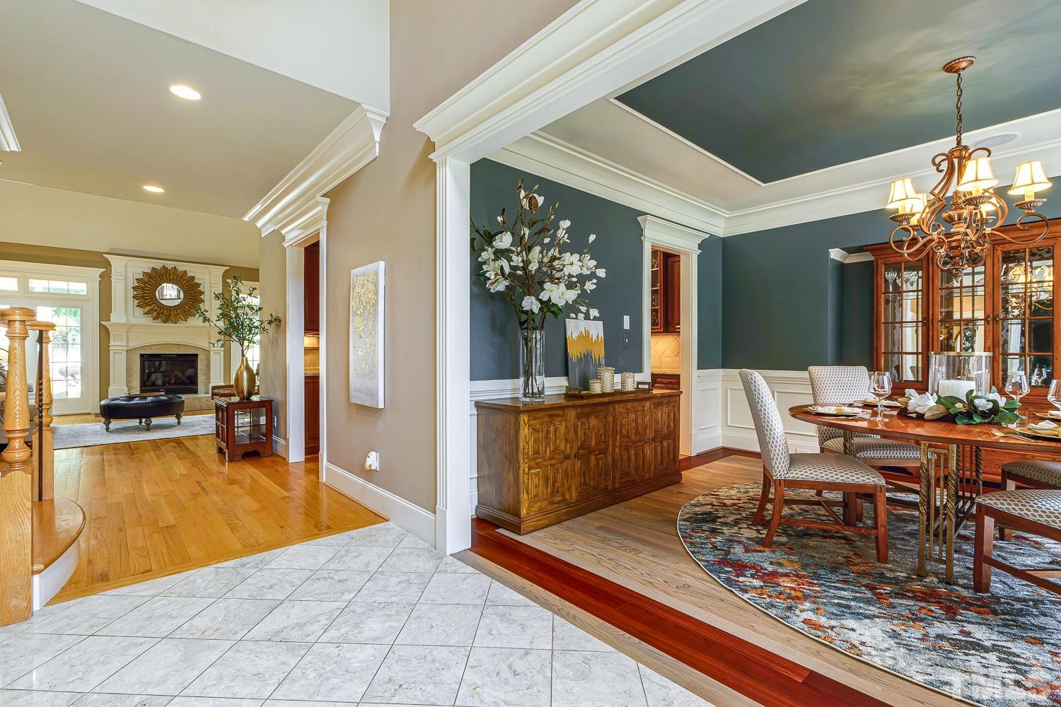5201 Rathkeale Court Holly Springs, NC 27540 - Photo 5 of 46 a view of a dining room with furniture