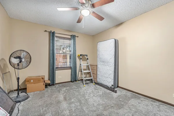 a view of room with workspace and window