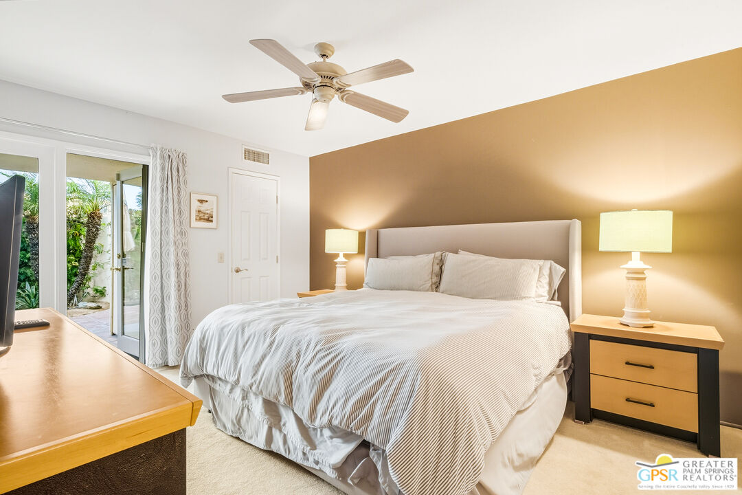 1103 East Alejo Road Palm Springs, CA 92262 - Photo 28 of 39 a bedroom with a bed and a dresser